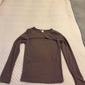 Long sleeve top with front cut out.